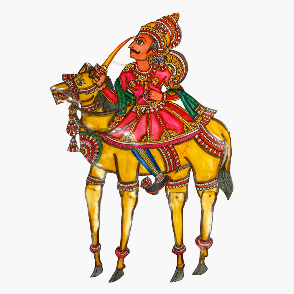 A brightly coloured puppet of Kalki, an avatar of Vishnu. He is riding a yellow horse with decorative trapping. He is wearing pink and green with traditional jewellery and is wielding a sword.